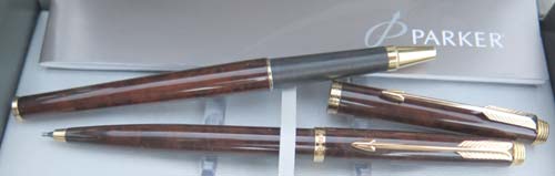 PARKER 75 ROLLERBALL AND PENCIL SET IN REDISH BROWN BURLE LACQUER ON BRASS. 